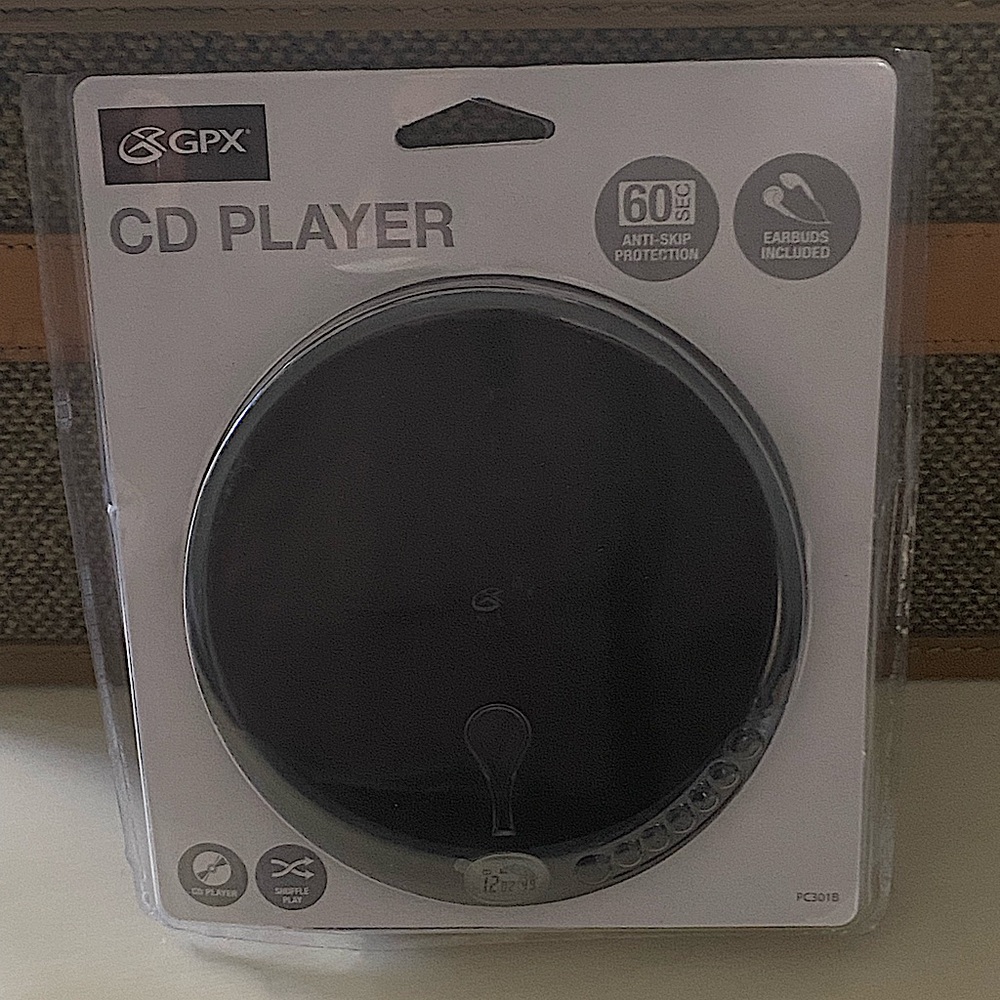 Vintage Portable CD player with Headphones.